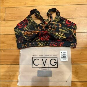 NWT CVG Sz M Dressed to Kill Butterfly Back Sports Bra. New with tag.